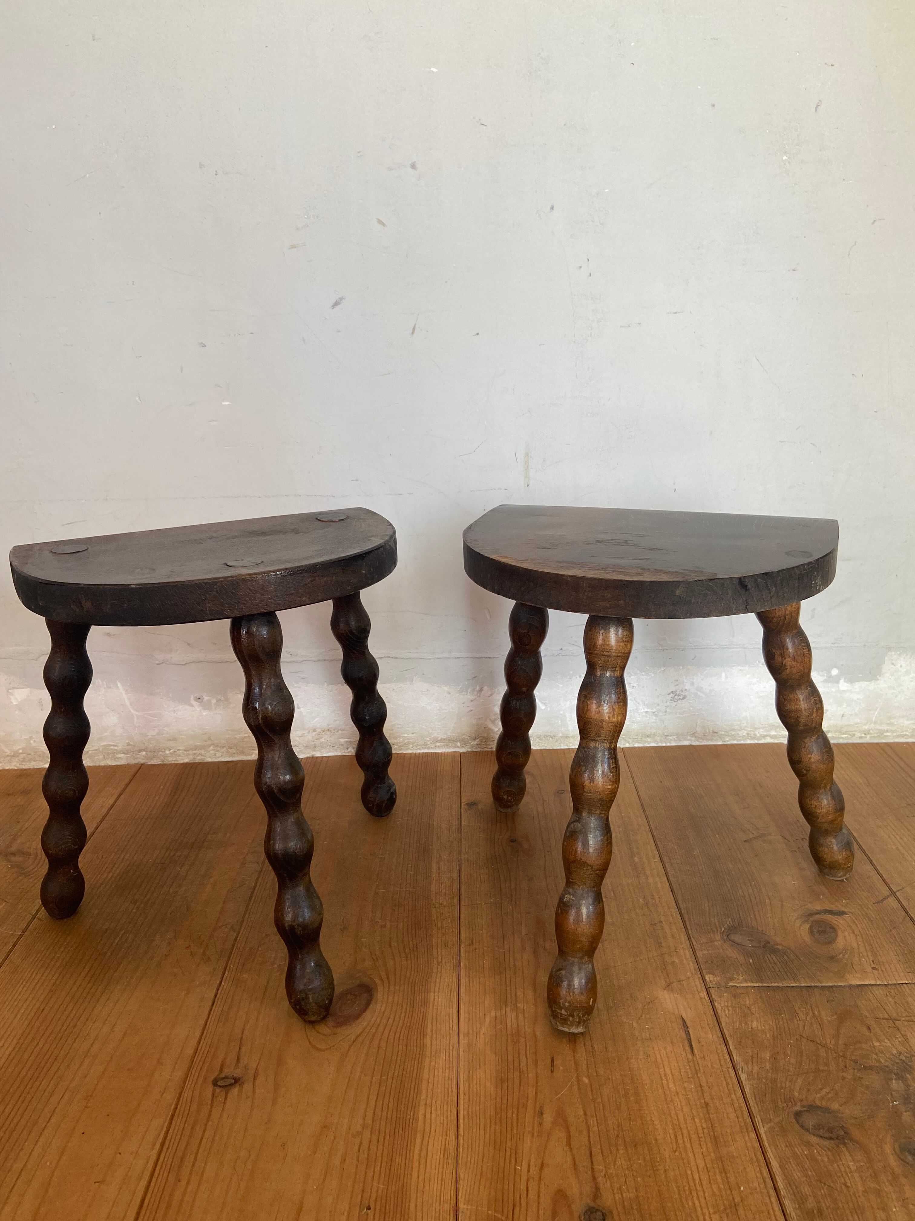Pair of old low slag stools