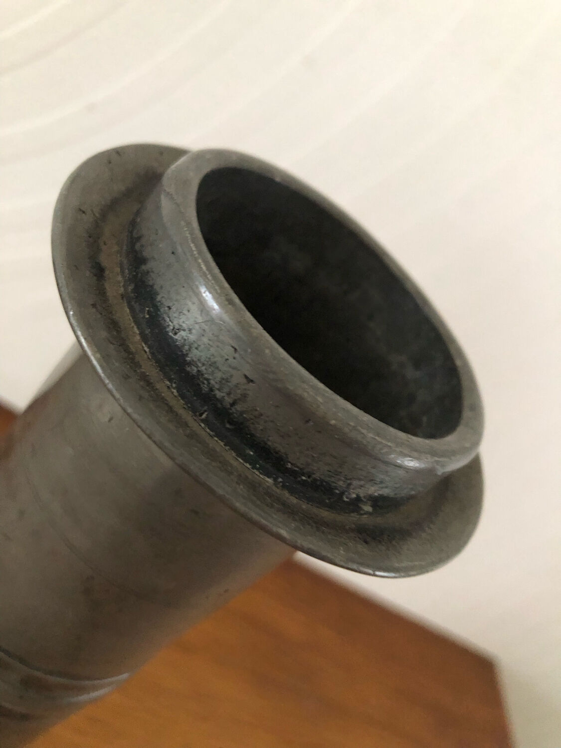 Antique pewter candle holder