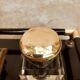 Hence the art deco inkwell on jet plate brass finishes