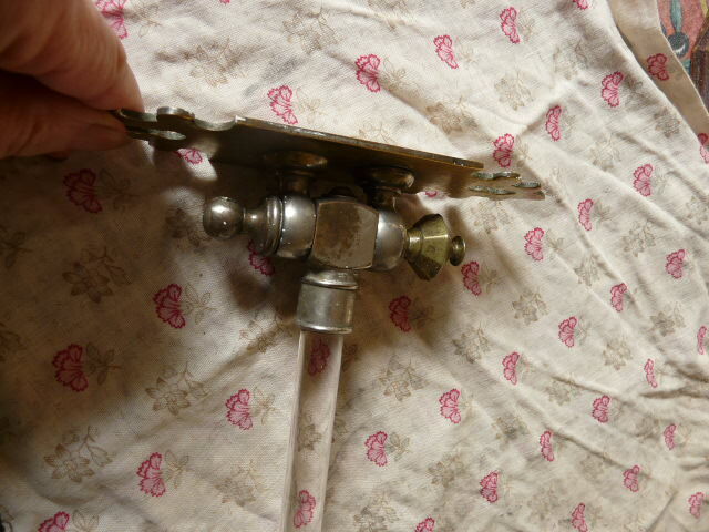 Chromed metal towel rack and glass rod