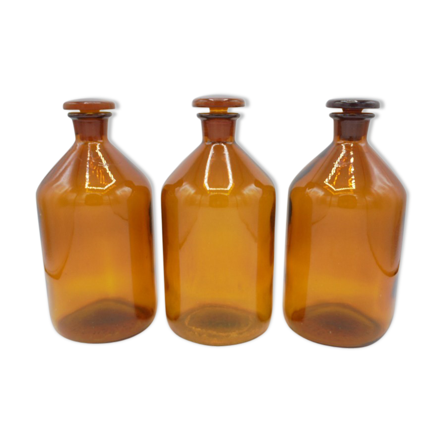 Trio of apothecary bottles