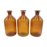 Trio of apothecary bottles