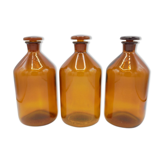 Trio of apothecary bottles