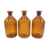 Trio of apothecary bottles