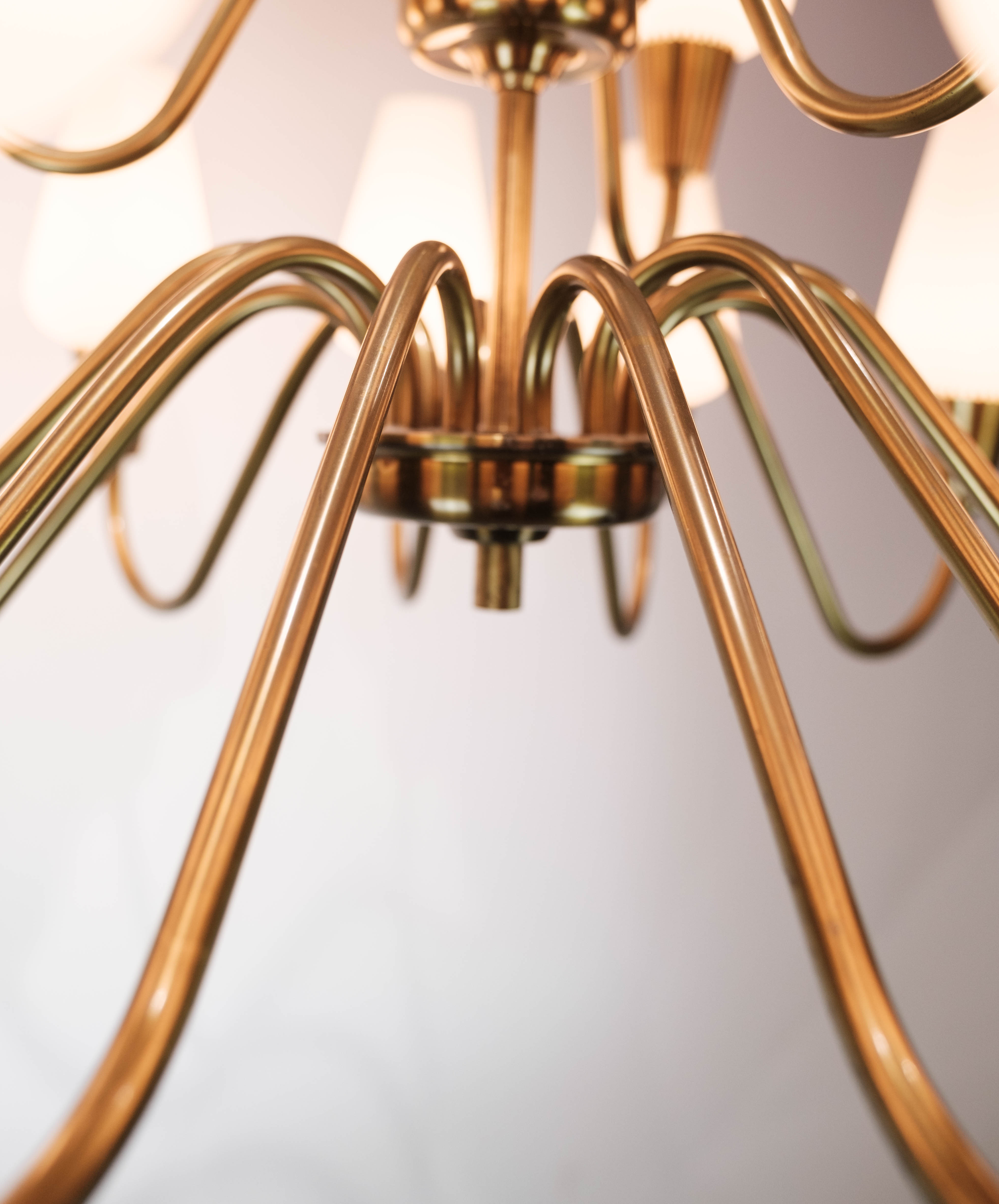 Lamp with arms of brass and glass, of Danish design from the 1950s