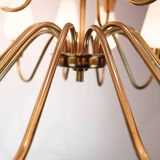 Lamp with arms of brass and glass, of Danish design from the 1950s