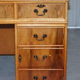 Vintage satin wood partner desk with leather top.