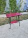 occasional table on wheels - red faux leather - vintage