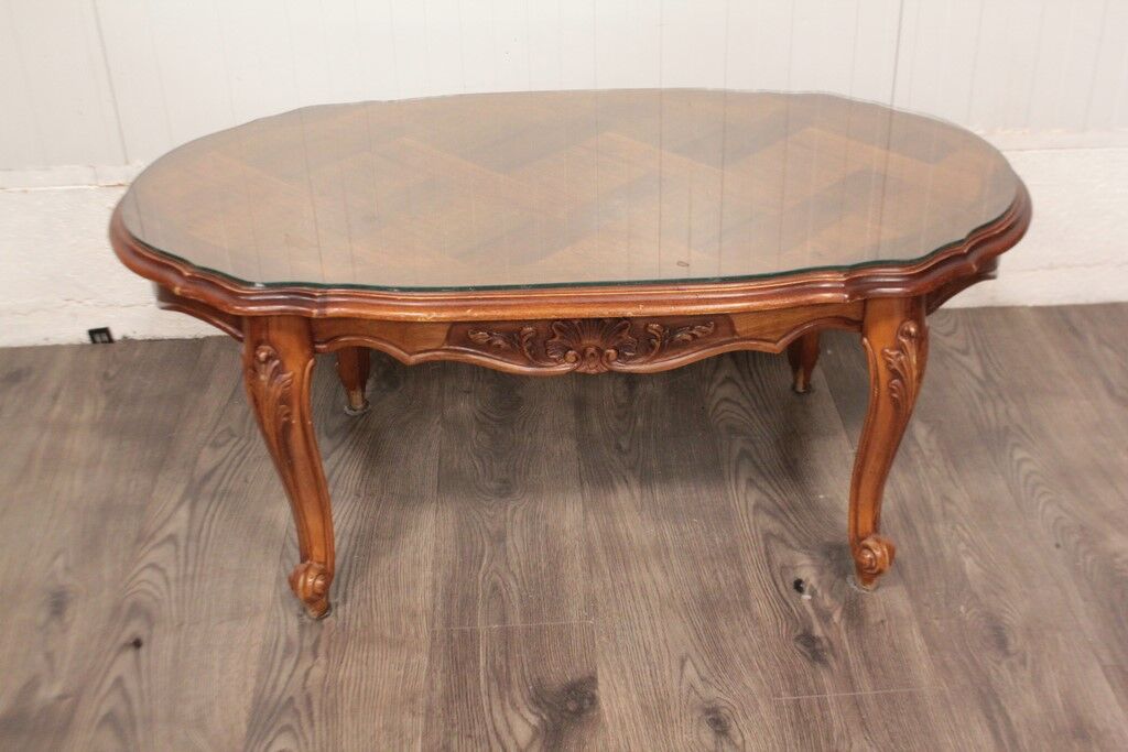 Louis XV style oval coffee table with glass top