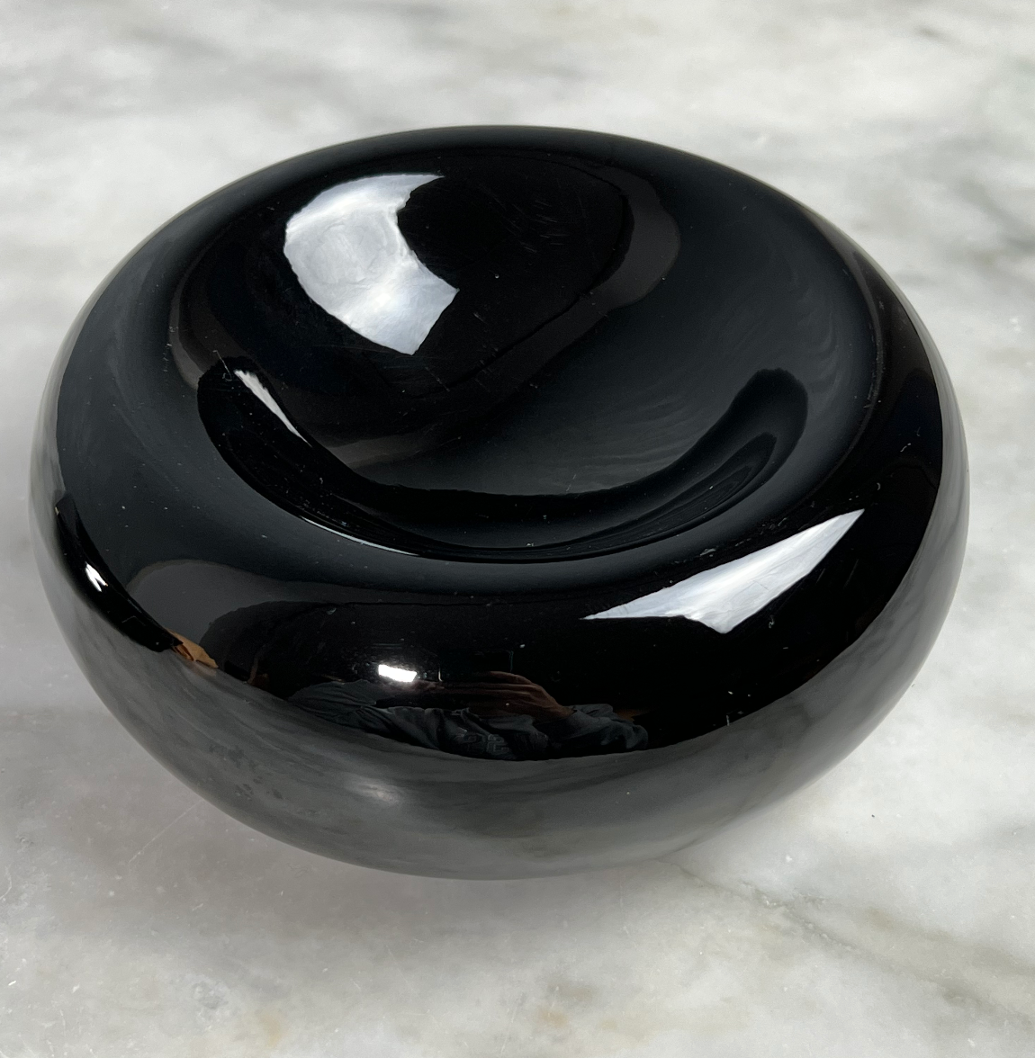 Ceramic ashtray of round shape of the 80s.