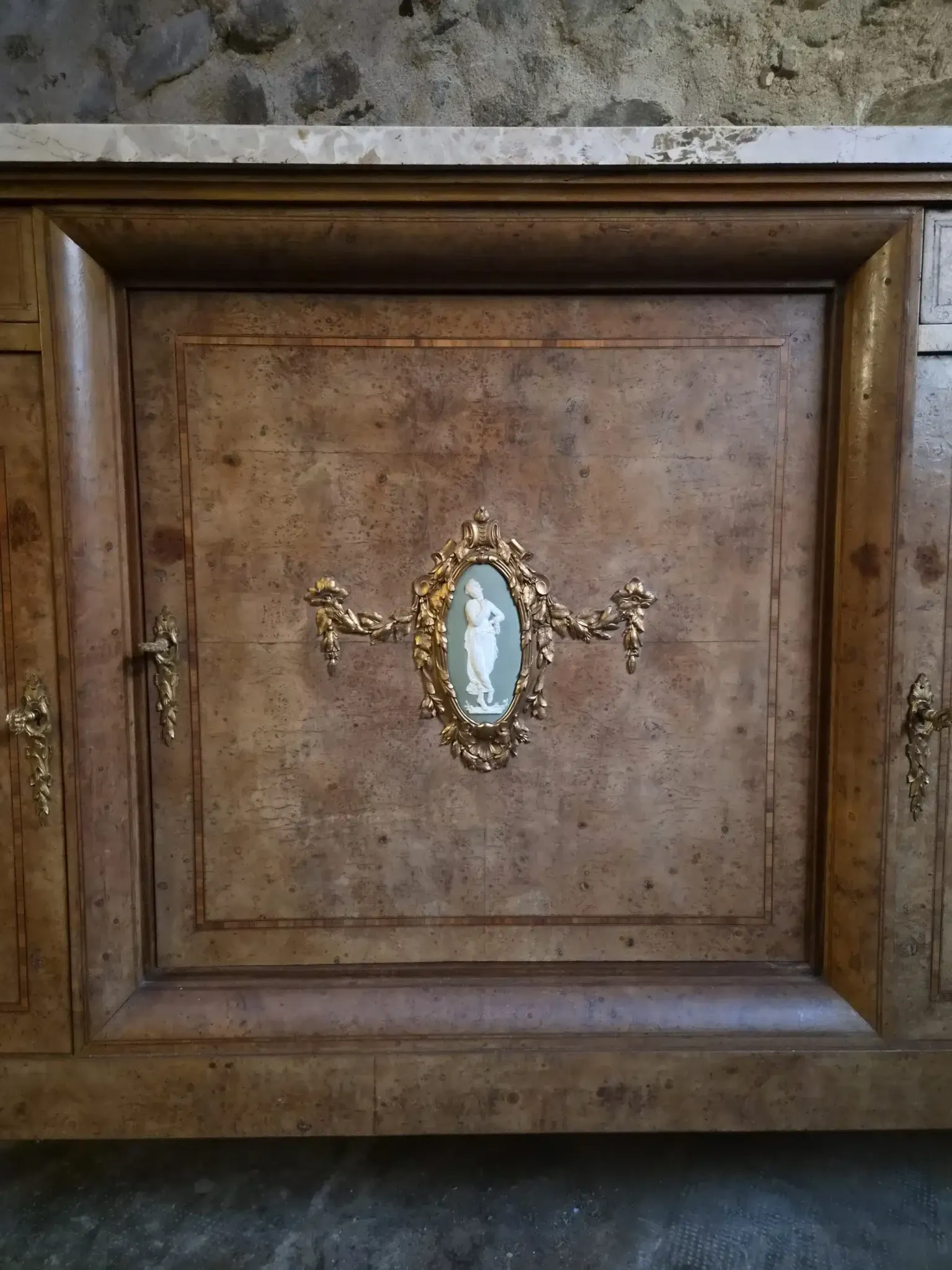 Antique Louis XVI style buffet in burr elm with marble top, late 19th century.