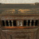 Old Renaissance bonnetière in solid oak with brown patina around 1750