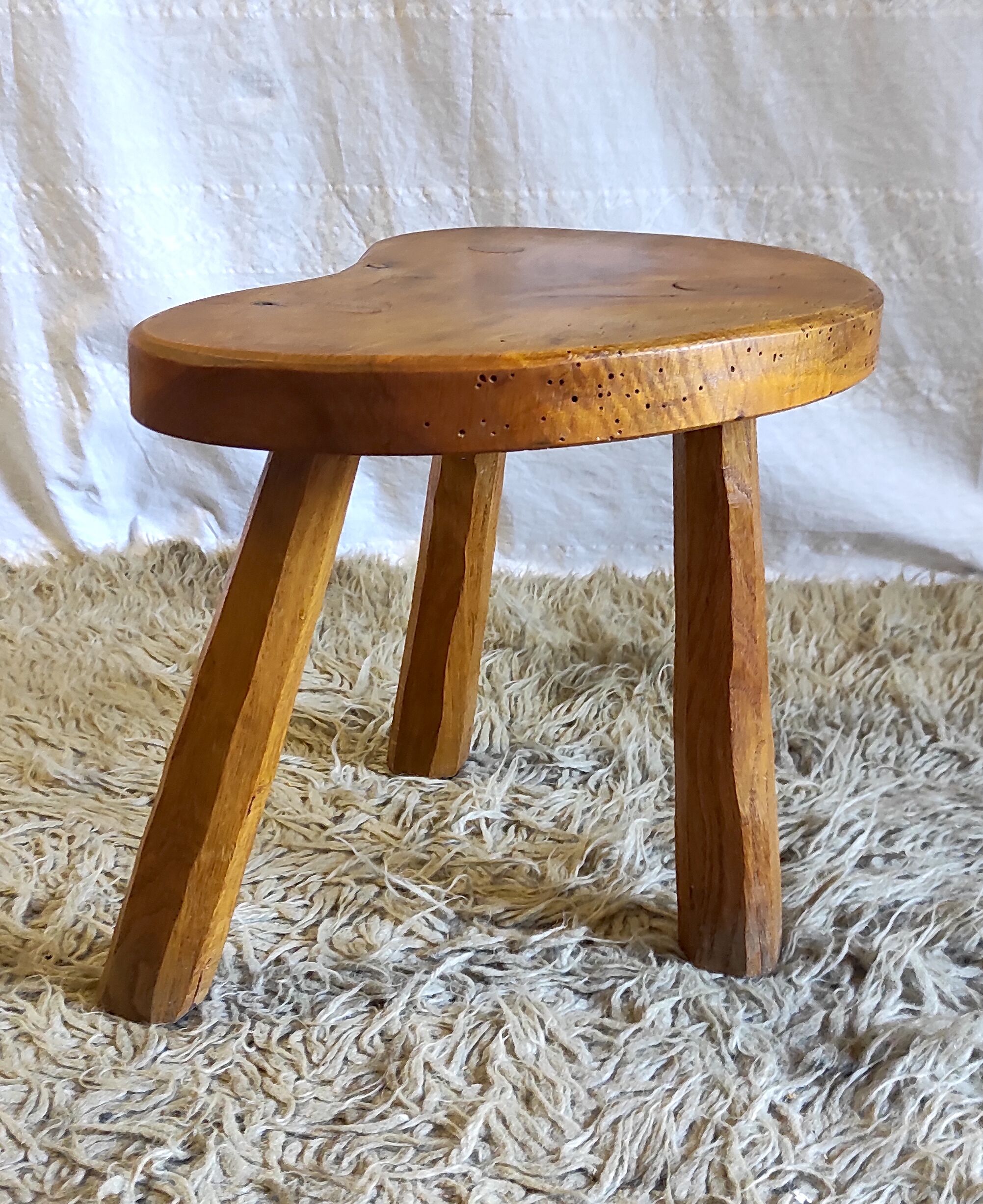 Brutalist tripod stool in solid wood, 80s