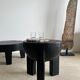 Black mango wood tripod side table with a semi-spherical top, height: 45 cm, diameter: 44 cm.