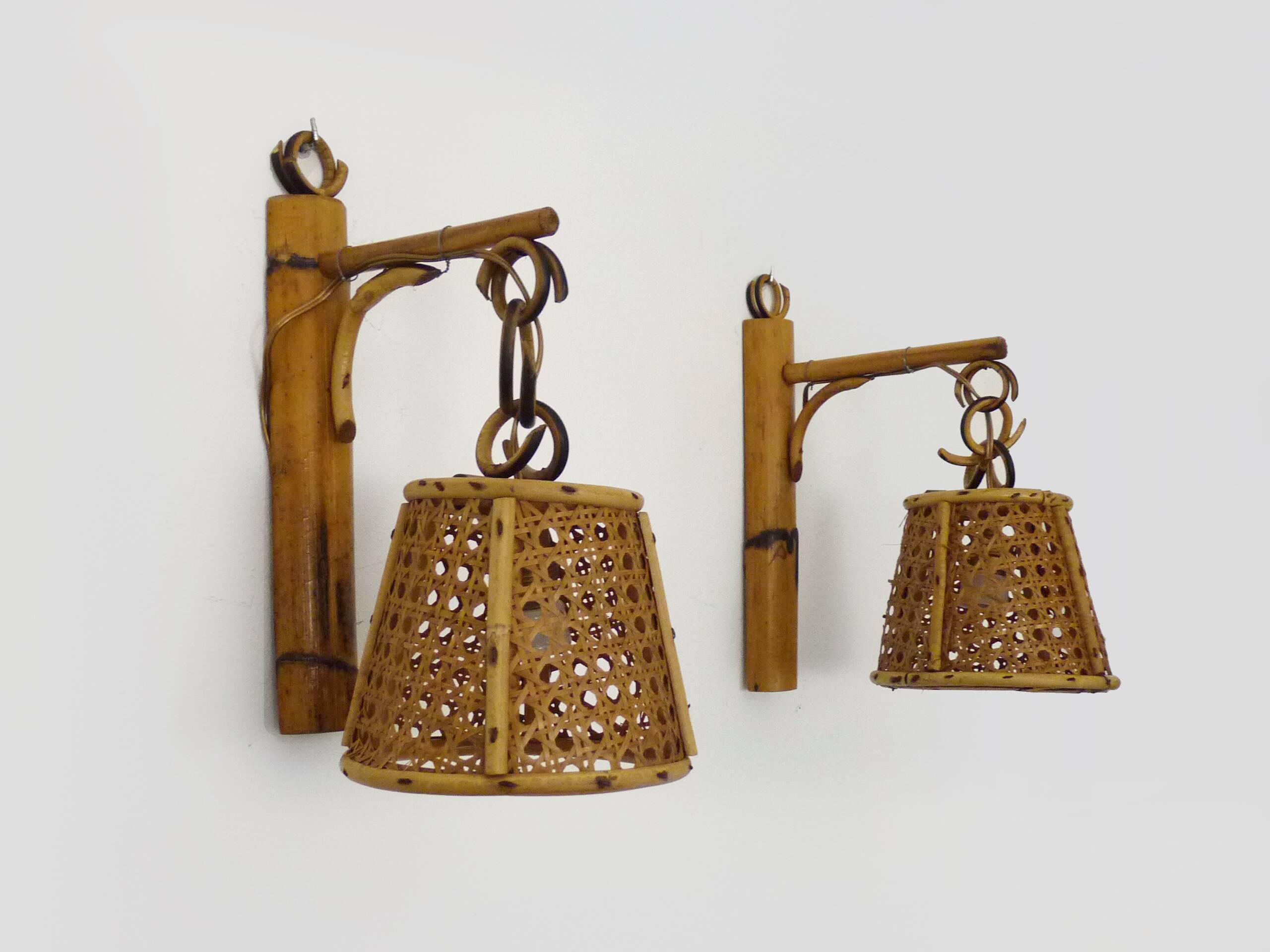 Pair of rattan and cane lantern wall lights. 1950s-1960s