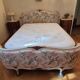 Bed frame with slatted base and mattress