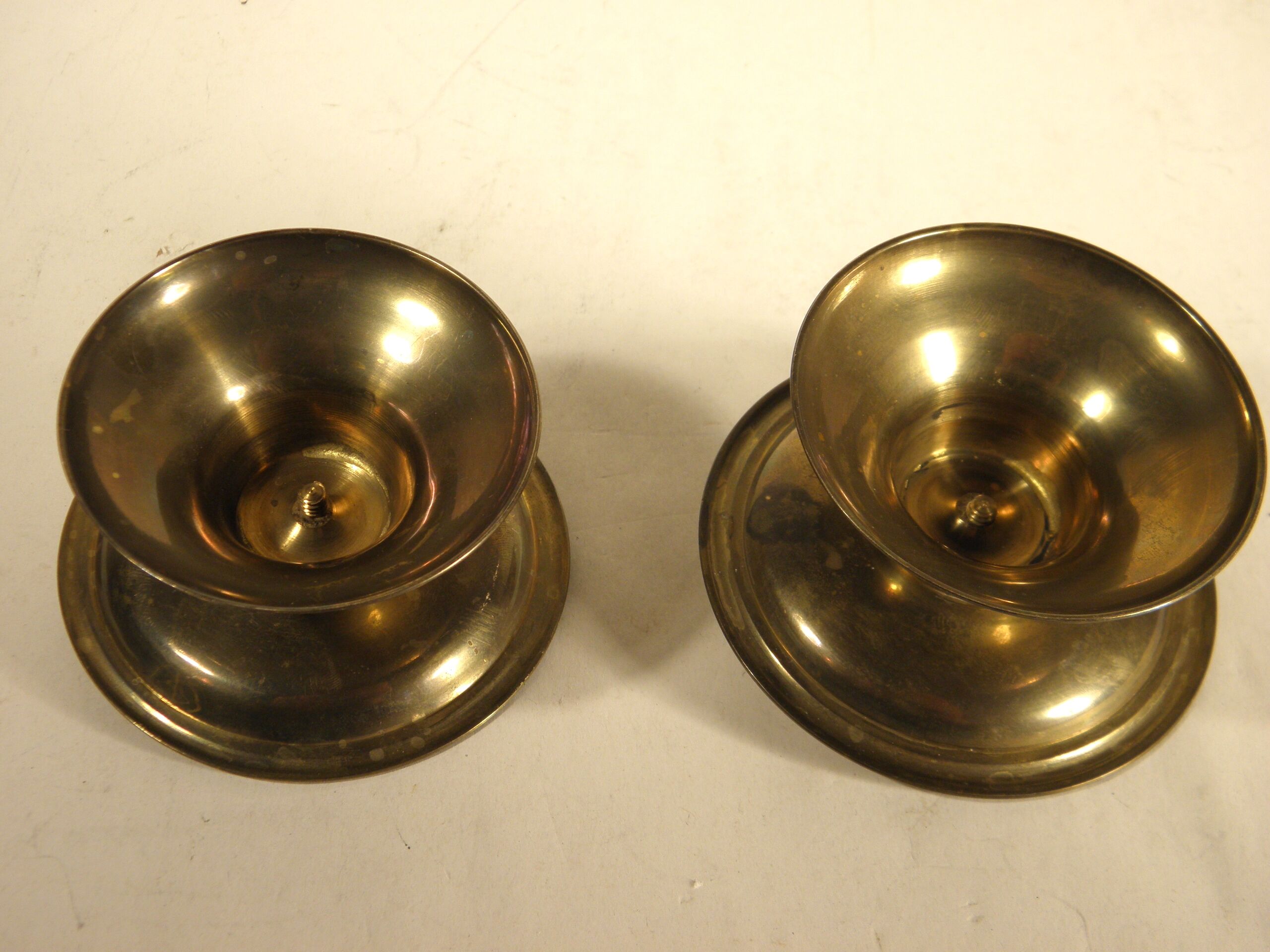 Pair of brass "pique - candle" candlesticks