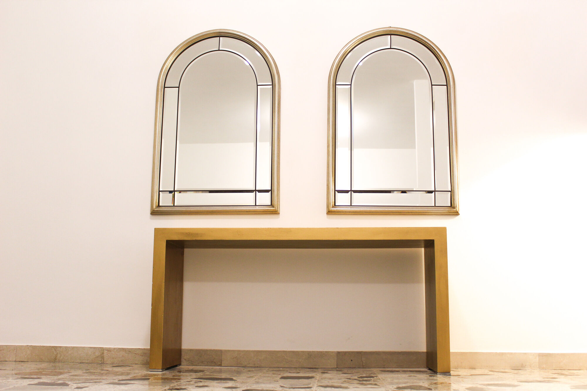 Pair of bevelled mirrors, brass edging frame in brushed wood years Italy 70's