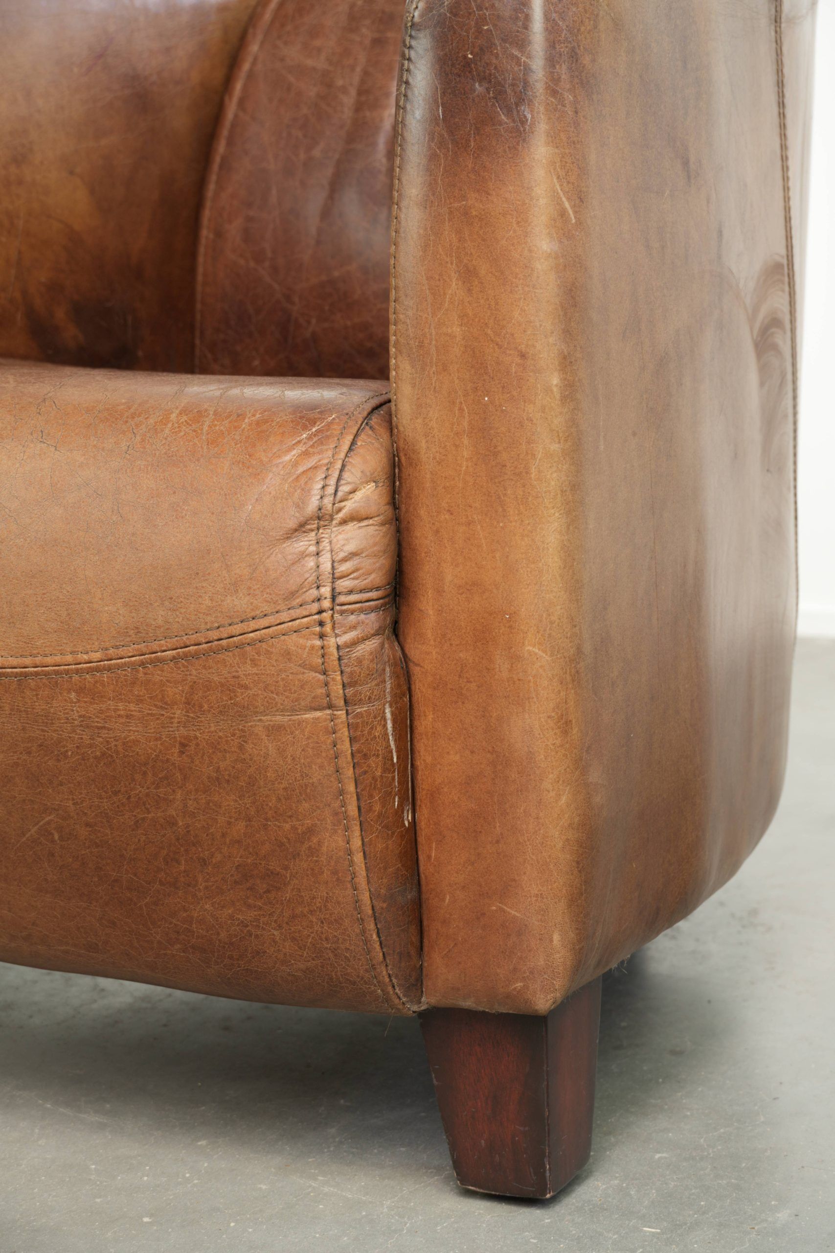 Fauteuil design aviateur en cuir de vache couleur cognac intemporelle