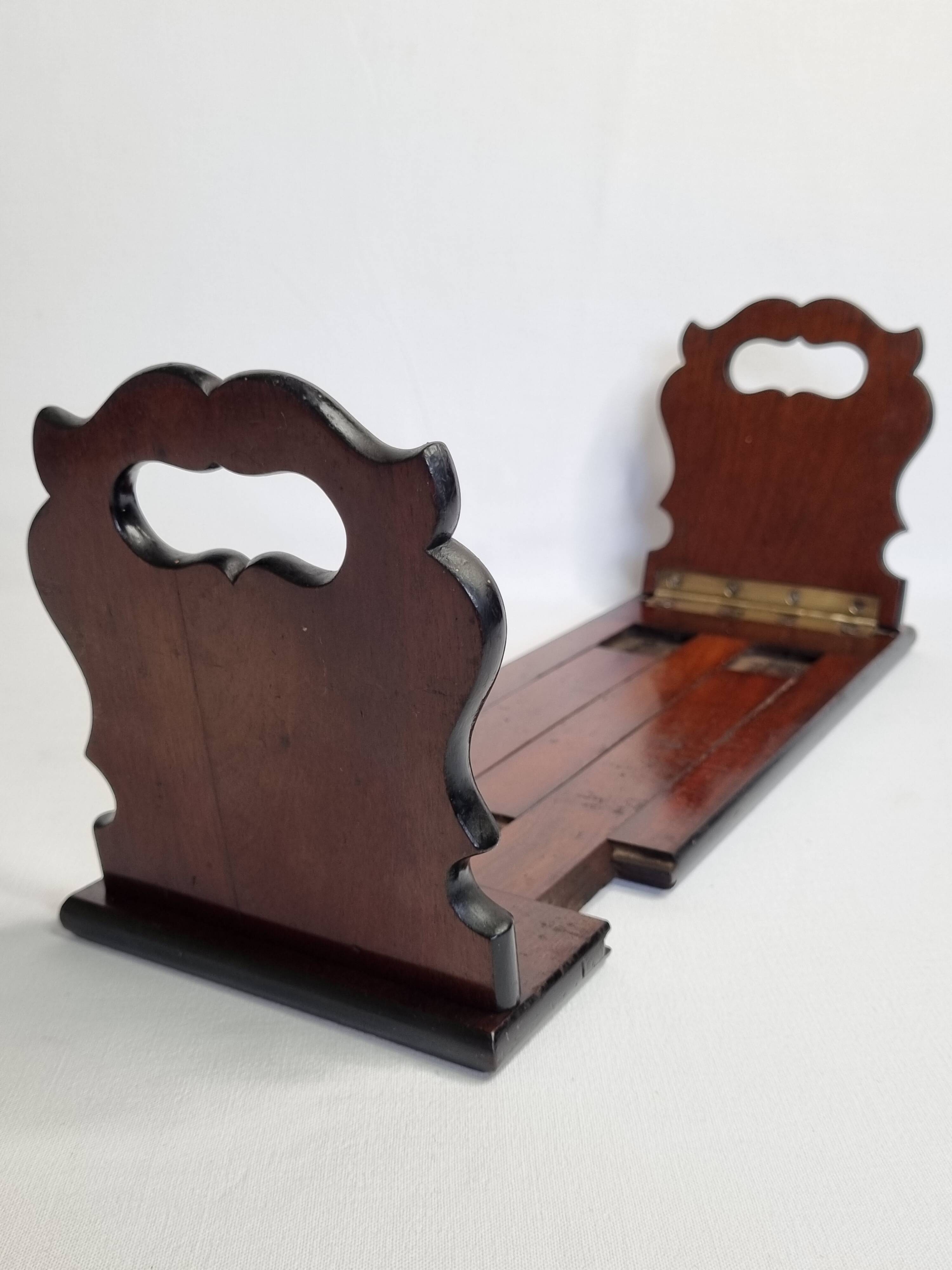 Solid wood zippered bookend, folding, 1900