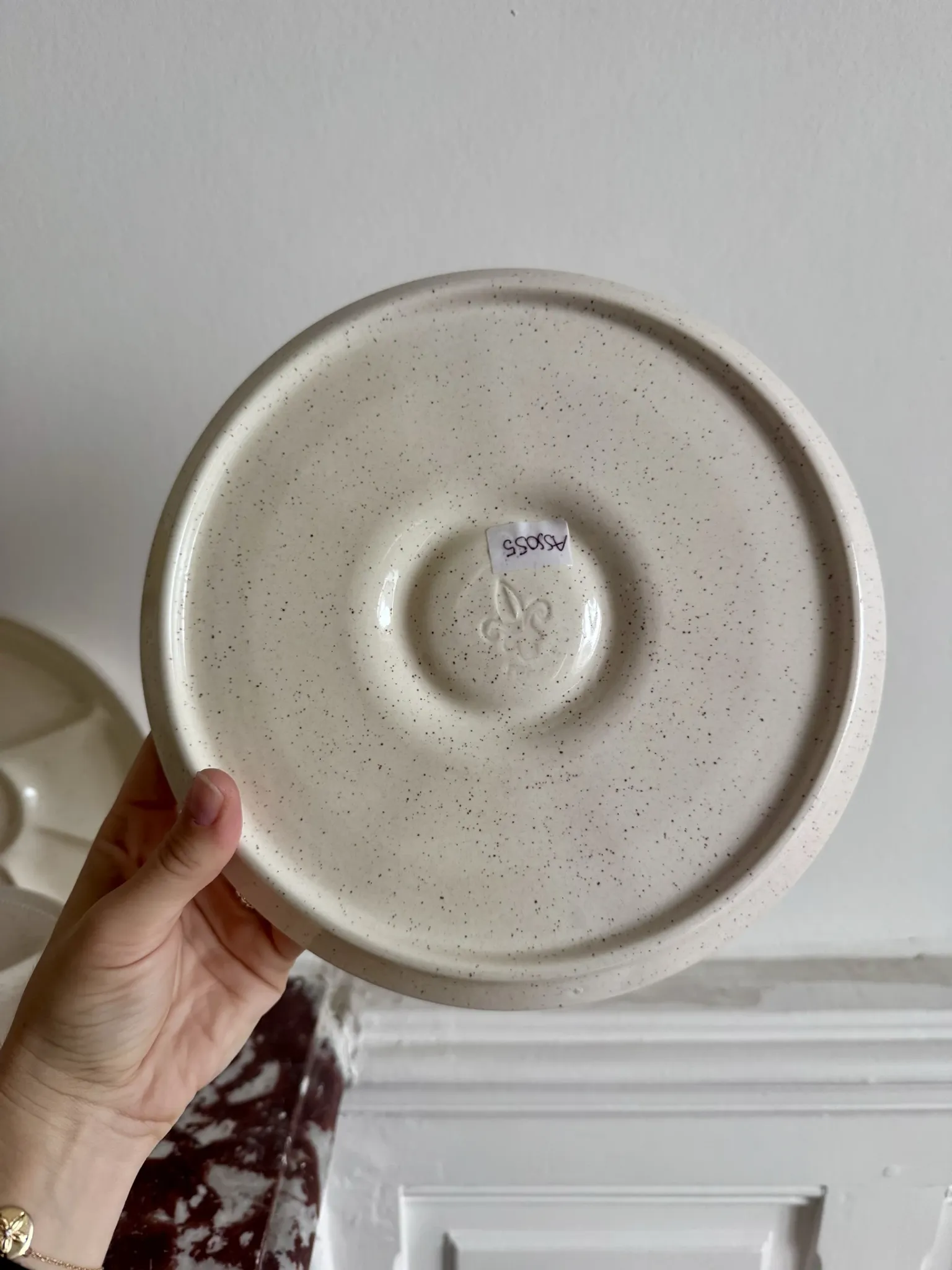 The earthenware fondue plates from Haute-Provence.