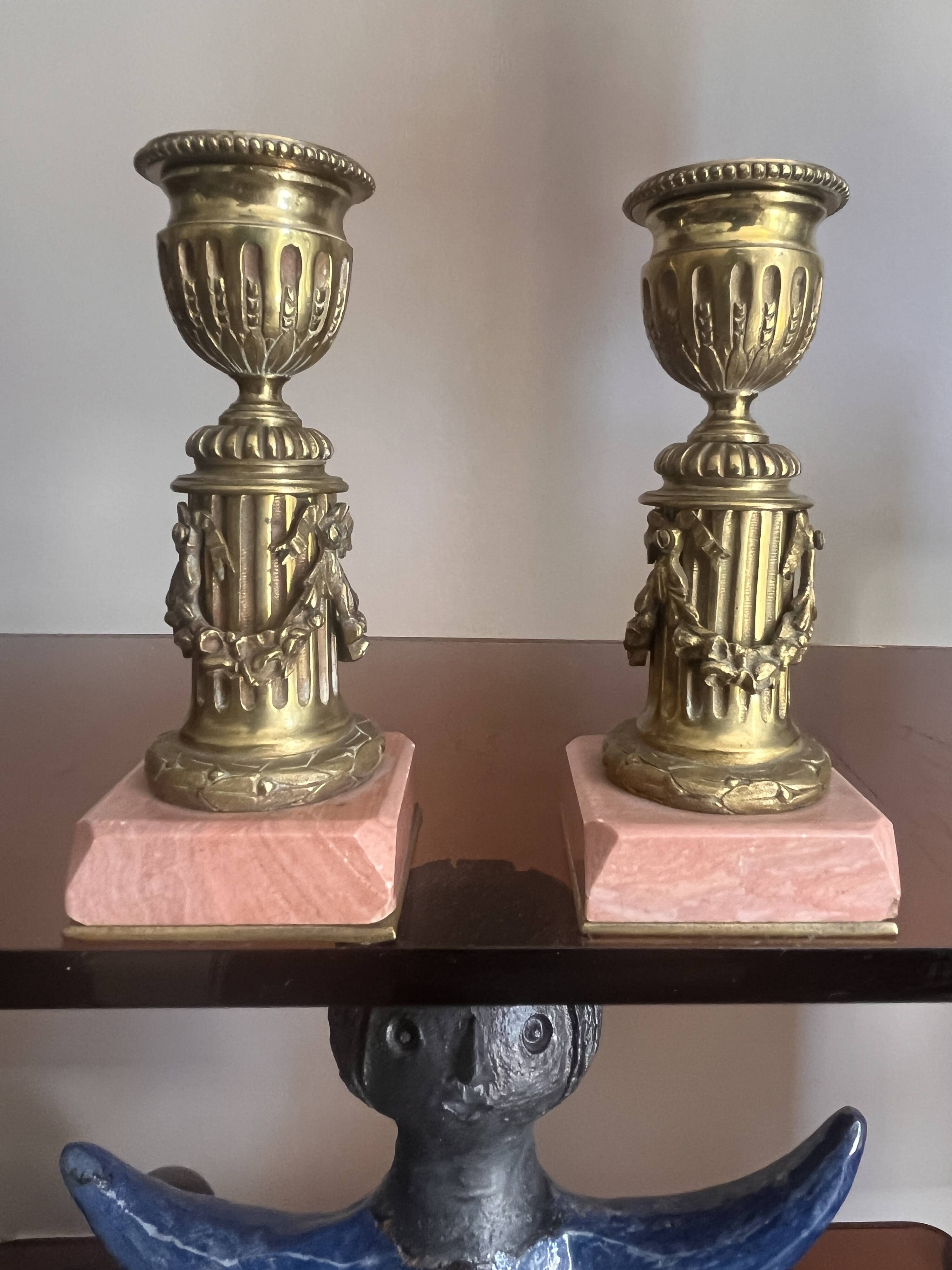 pair of antique bronze candlesticks