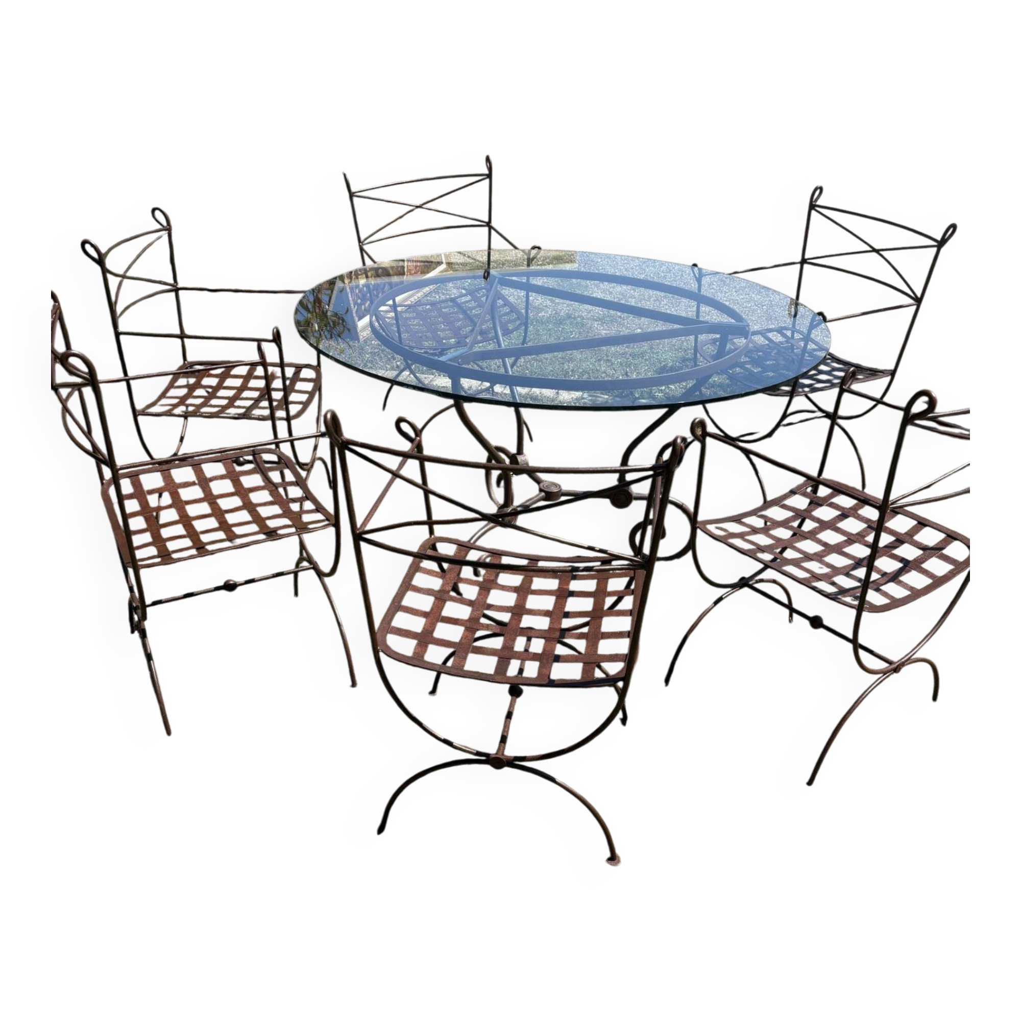 Wrought iron table and chairs for indoor/outdoor use.