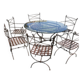 Wrought iron table and chairs for indoor/outdoor use.
