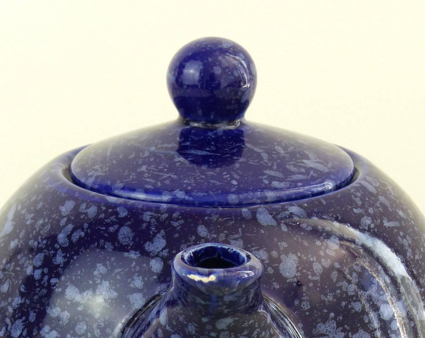 Blue glazed and speckled ceramic teapot