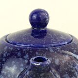 Blue glazed and speckled ceramic teapot