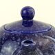 Blue glazed and speckled ceramic teapot