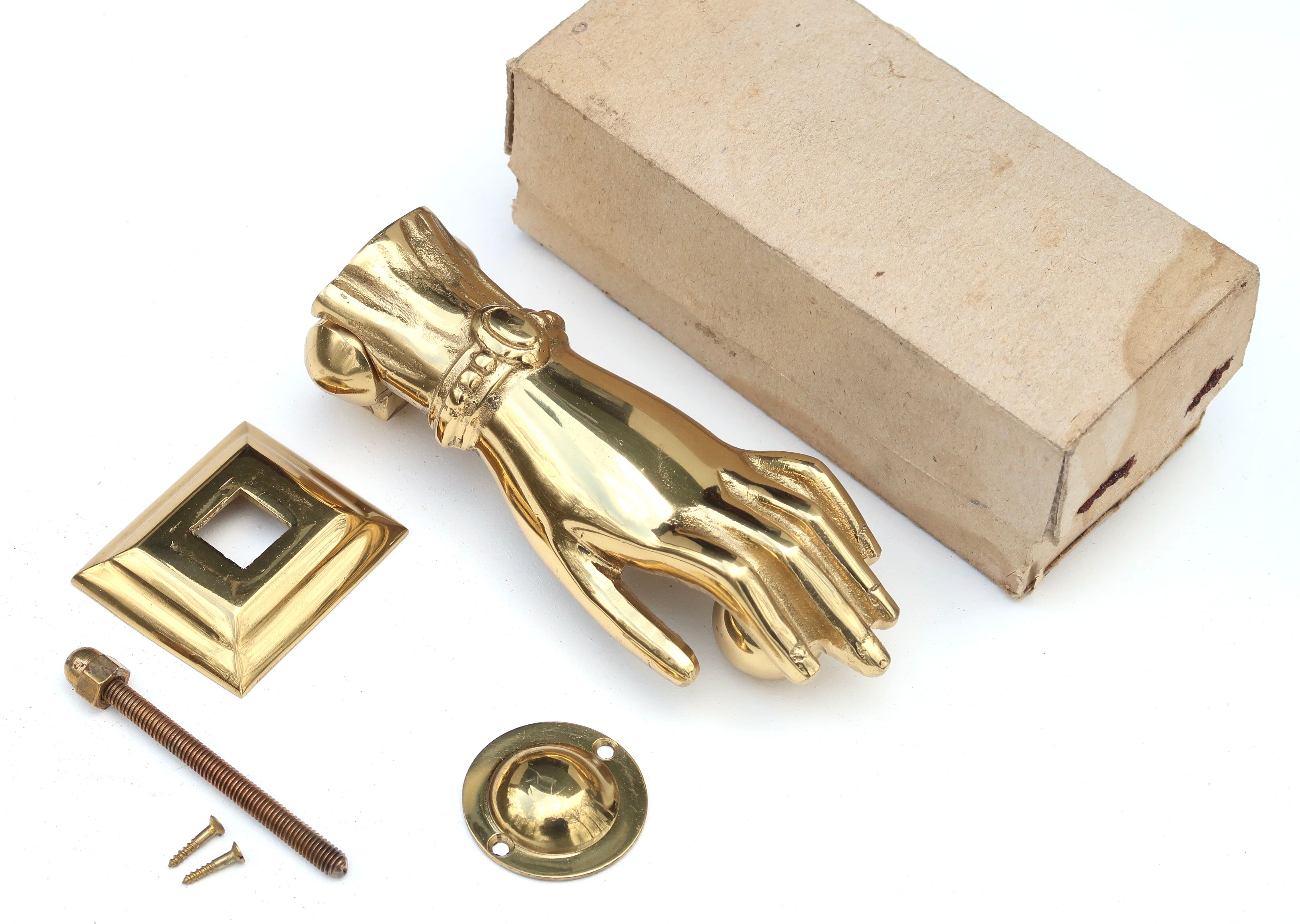 Brass hand-shaped door knocker, 1950s