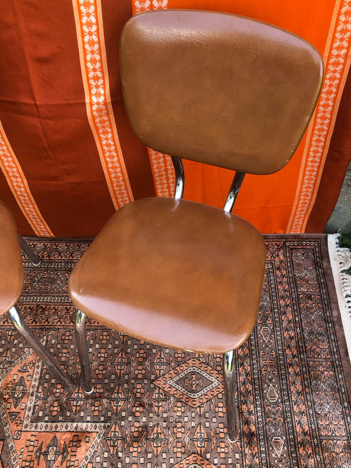Pair of imitation leather chairs