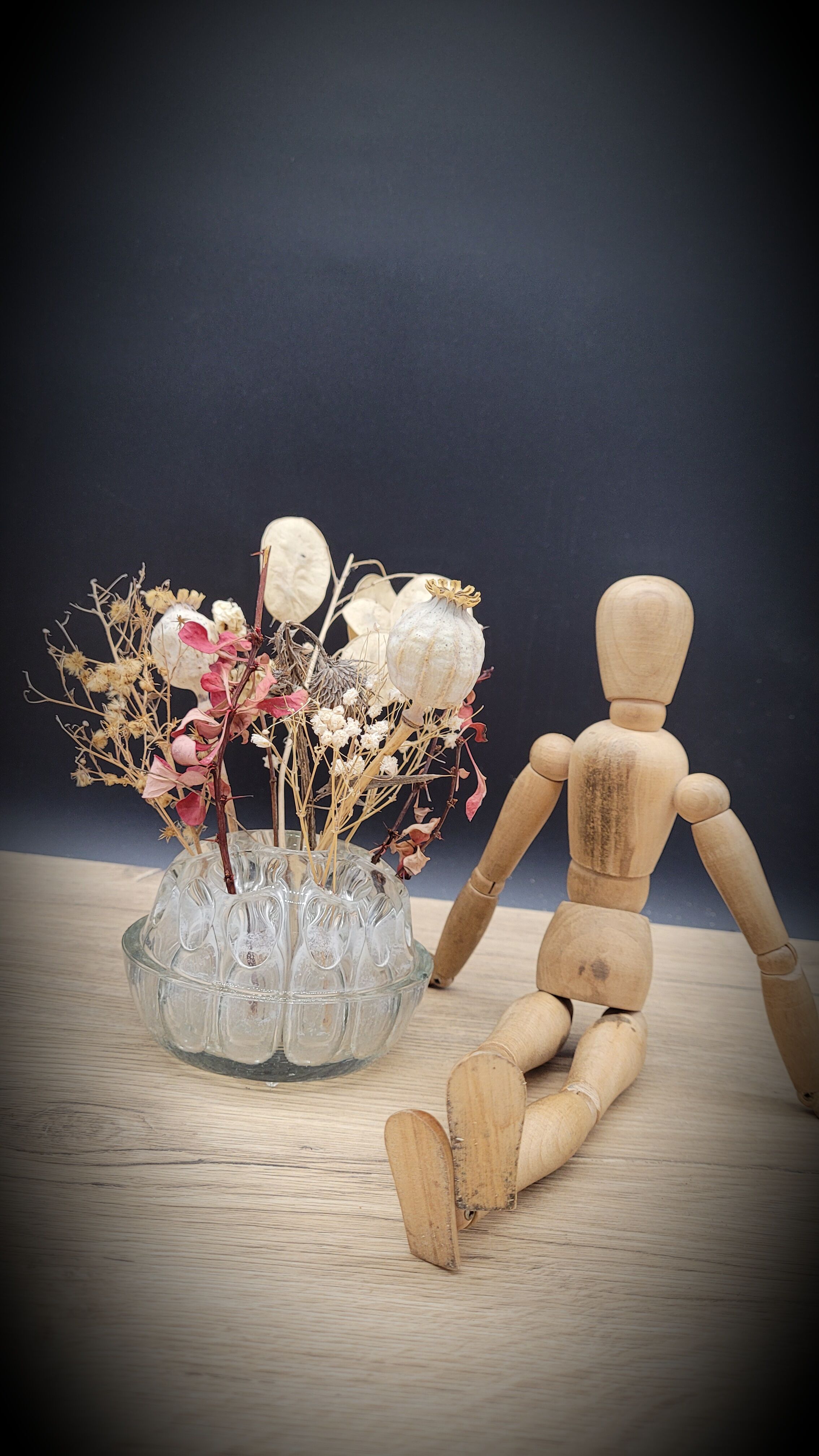 Pique flowers in glass of Reims