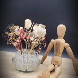 Pique flowers in glass of Reims