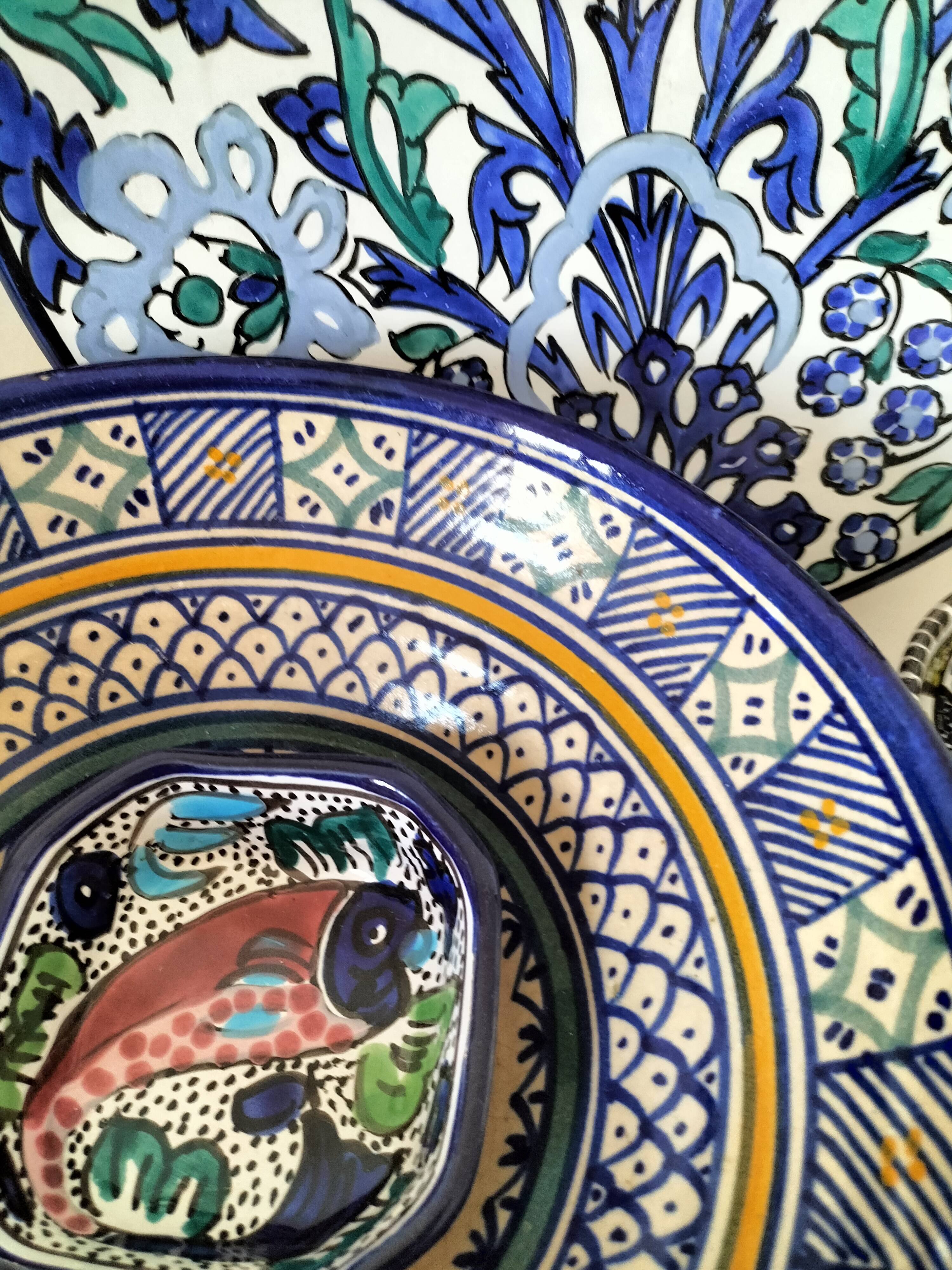 Set of 9 hand-painted Tunisian ceramics.