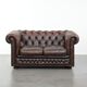 Dark brown cow leather vintage 2-seater Chesterfield sofa in English style