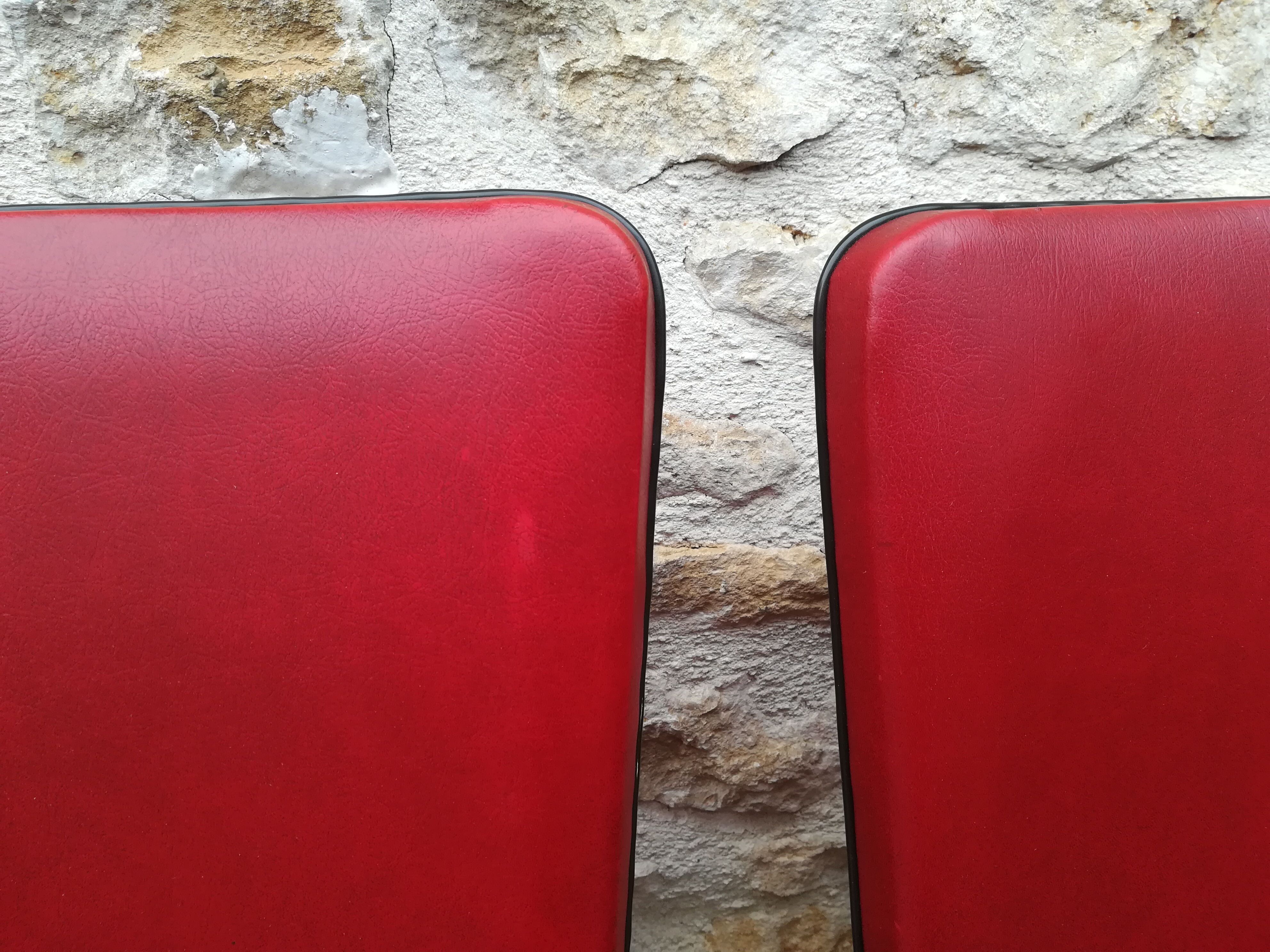 Chairs in red skaï