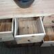 Industrial or apothecary workbench with 30 vintage wooden drawers.