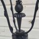 Black wrought iron floor lamp attributed to Gilbert Poillerat