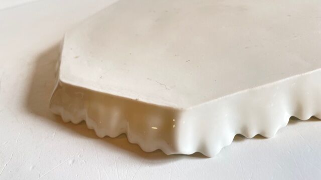 Old tray in floral pattern biscuit