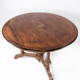 Round dining table of walnut with inlaid wood, 1890s