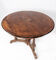 Round dining table of walnut with inlaid wood, 1890s