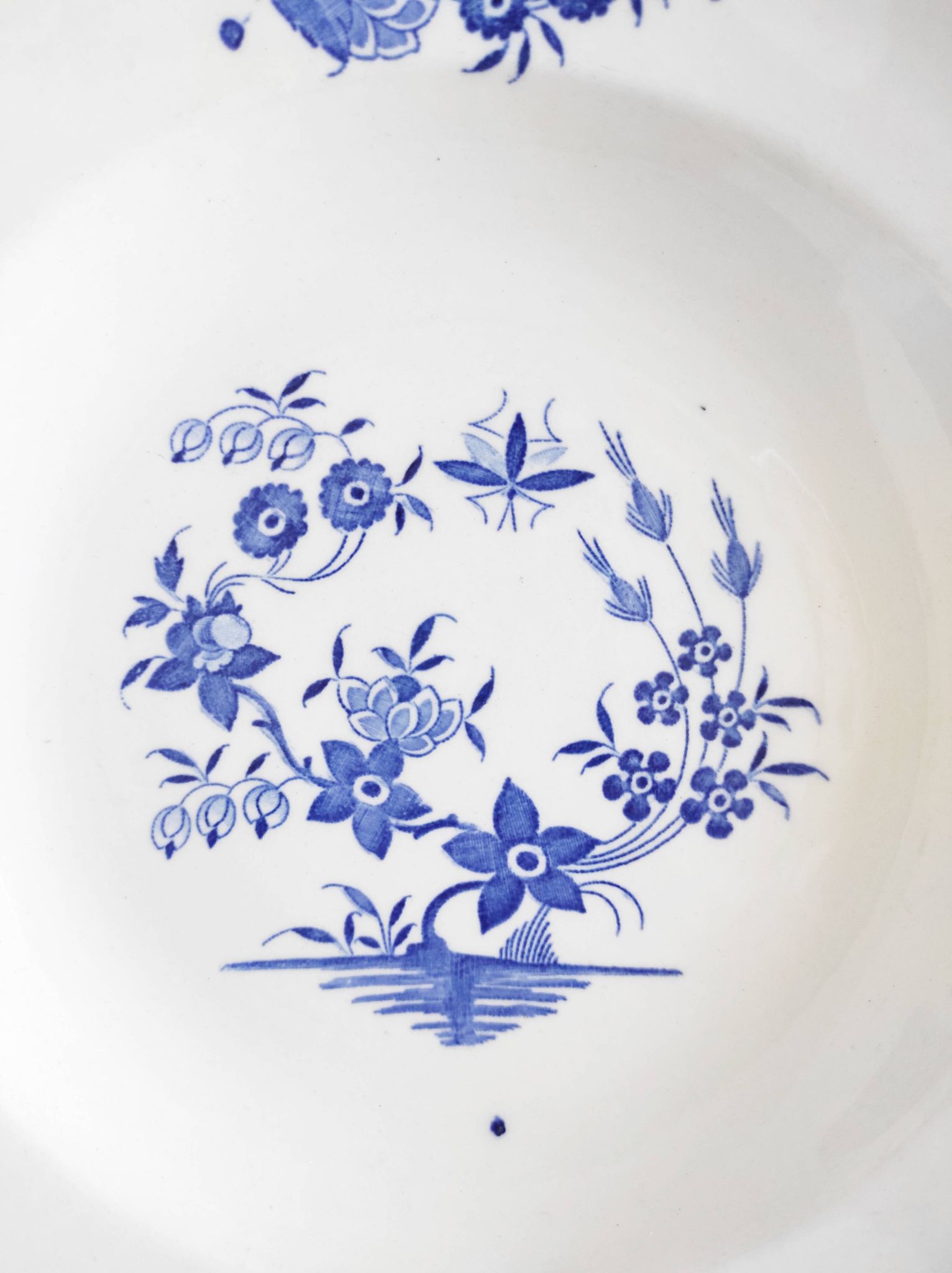 Boch Frères deep plate with large bouquet decoration