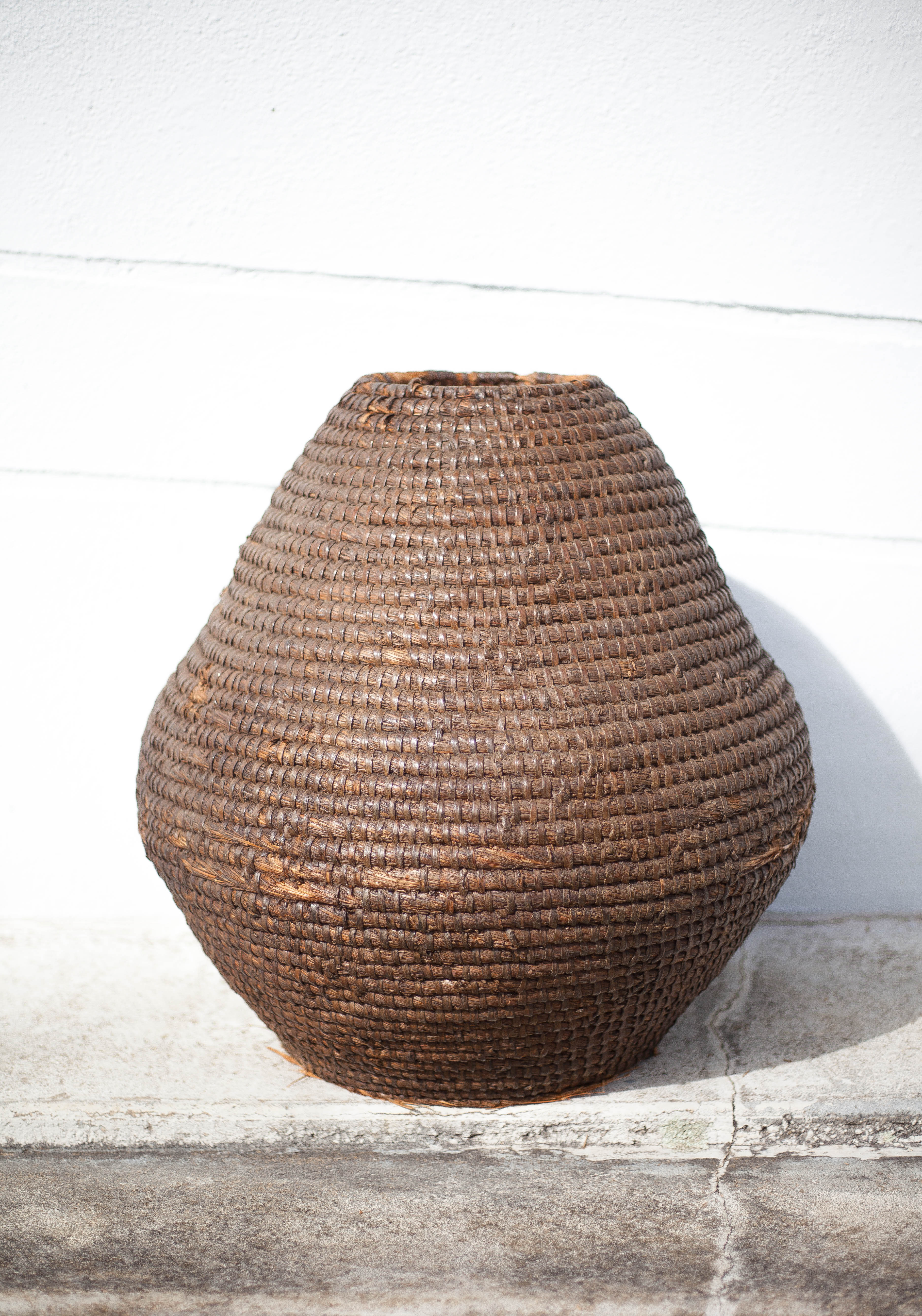 Old basket, straw and bramble bud