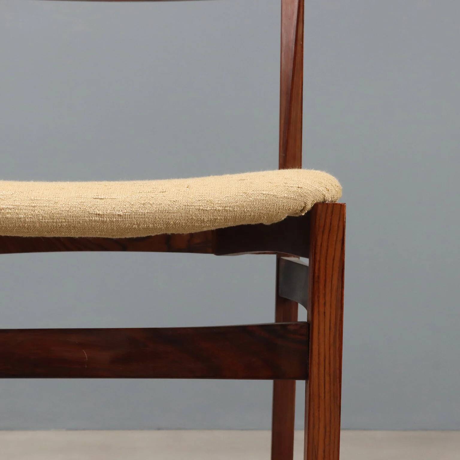 Vintage lounge chairs in exotic wood and fabric, 1960s design.
