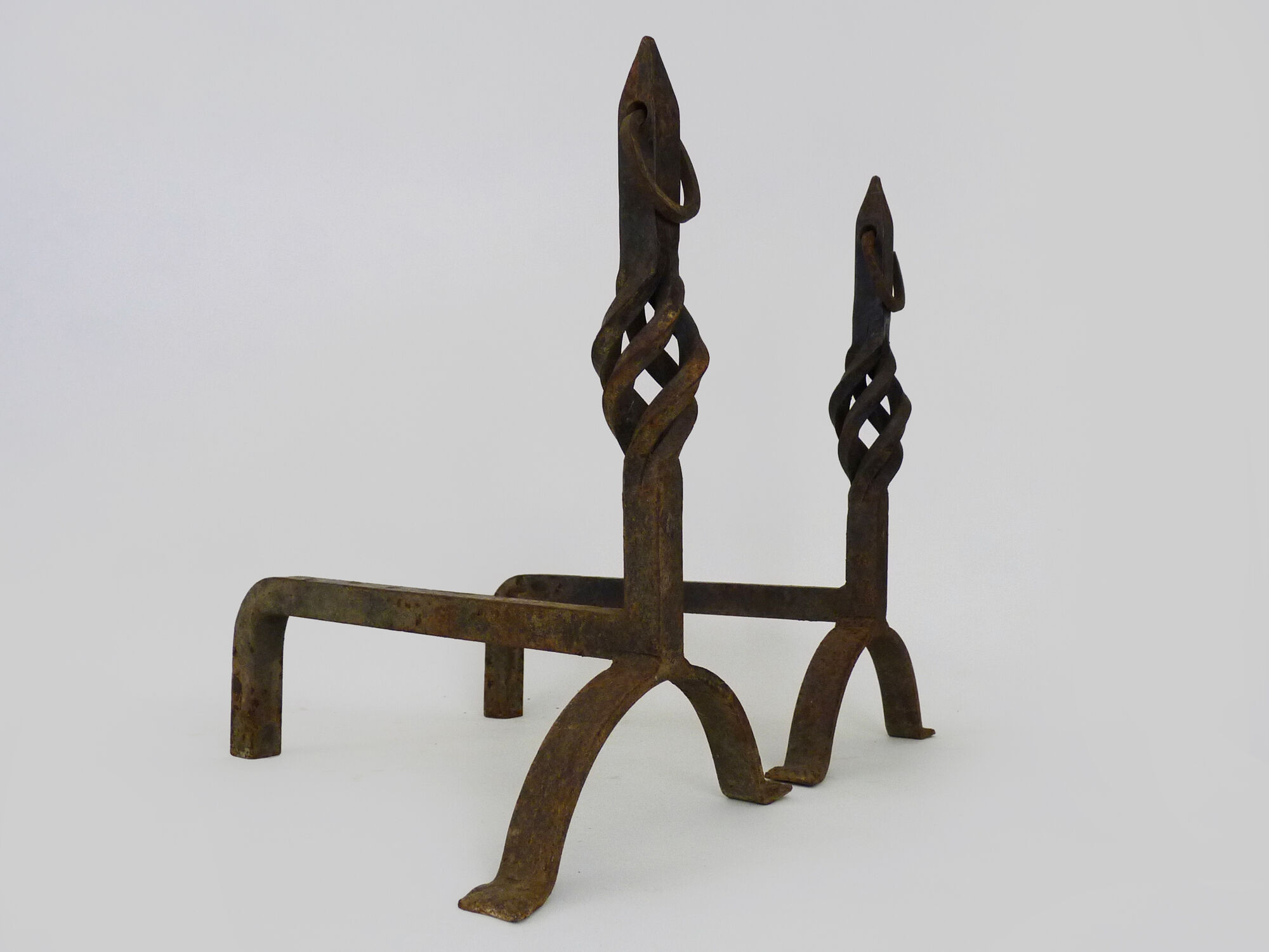 Large pair of cast iron chimney chenets. France 19th century