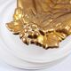 Antique hand-shaped brass soap holder
