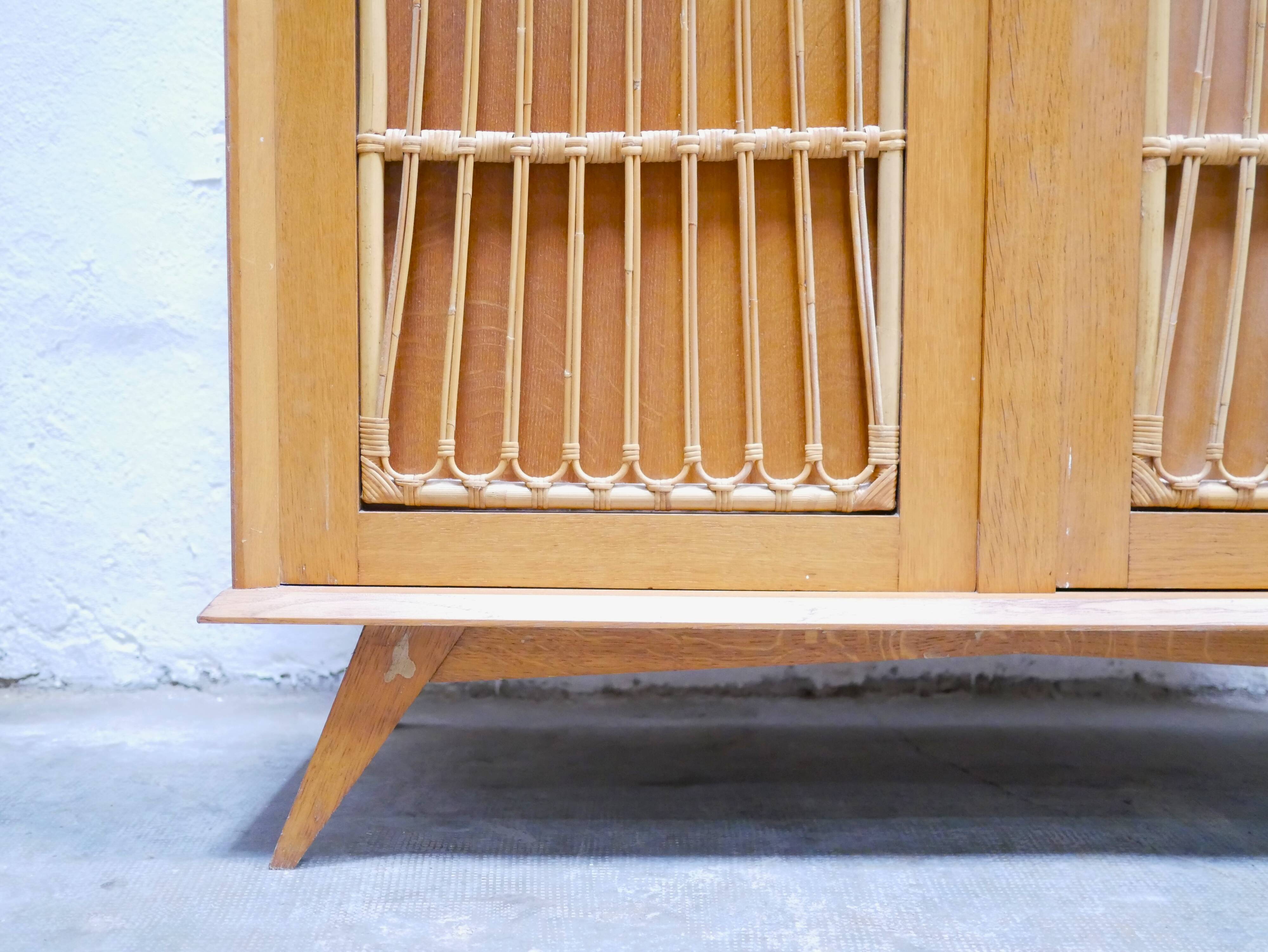 Vintage wardrobe in wood and rattan