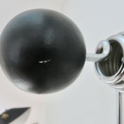 "Streamline" wall coat rack in chromed metal and black lacquered wood, 1970.